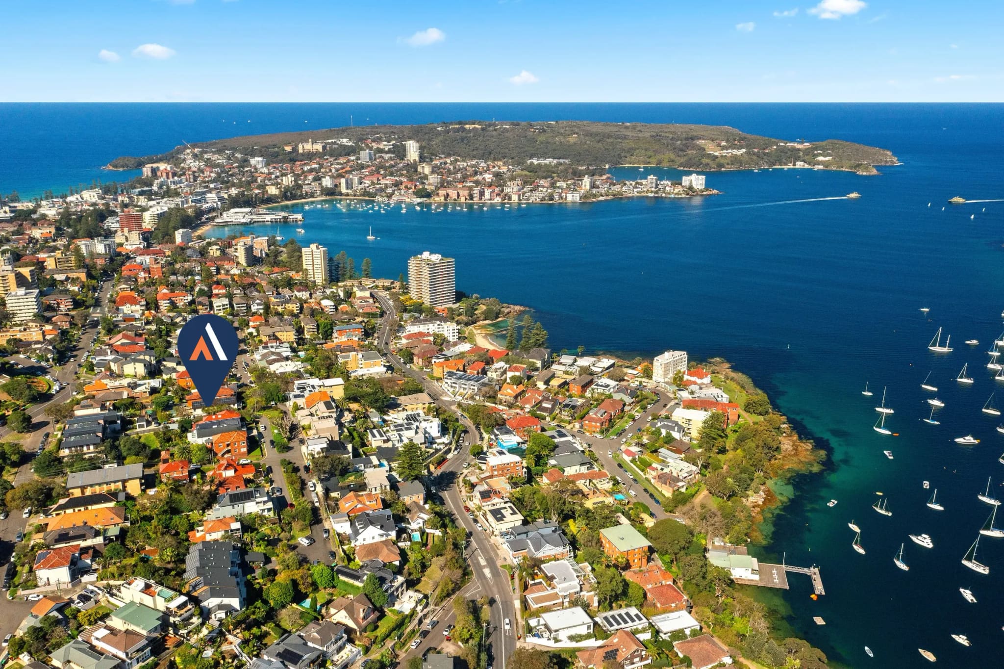 Aerial view over Fairlight to North Harbour, Manly and North Head, with a STRAND pin on a home bought for a client, Fairlight